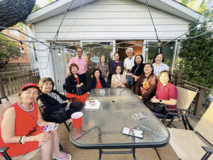 Filipino American community members share fellowship and conversation at the home of Tess Taylor in Washington, D.C., following a talk by Loida Nicolas Lewis on the challenges faced by Filipino Amerasians.Photo credit: Josie Moralidad Ziman / Facebook Profile